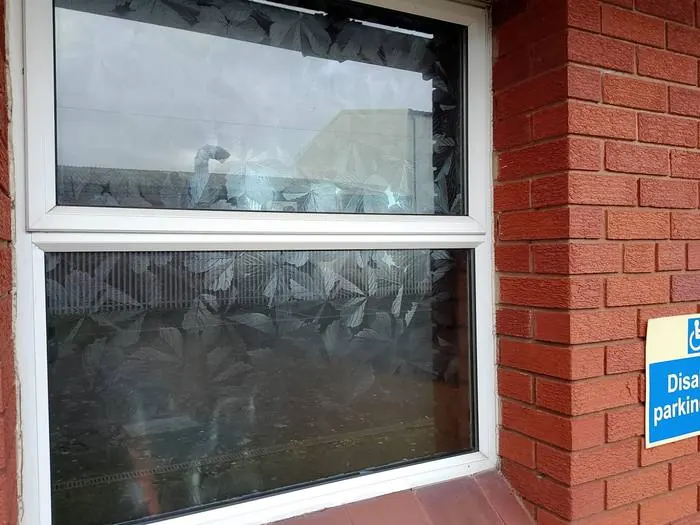 Exterior window cleaning on a commercial property by JTTW