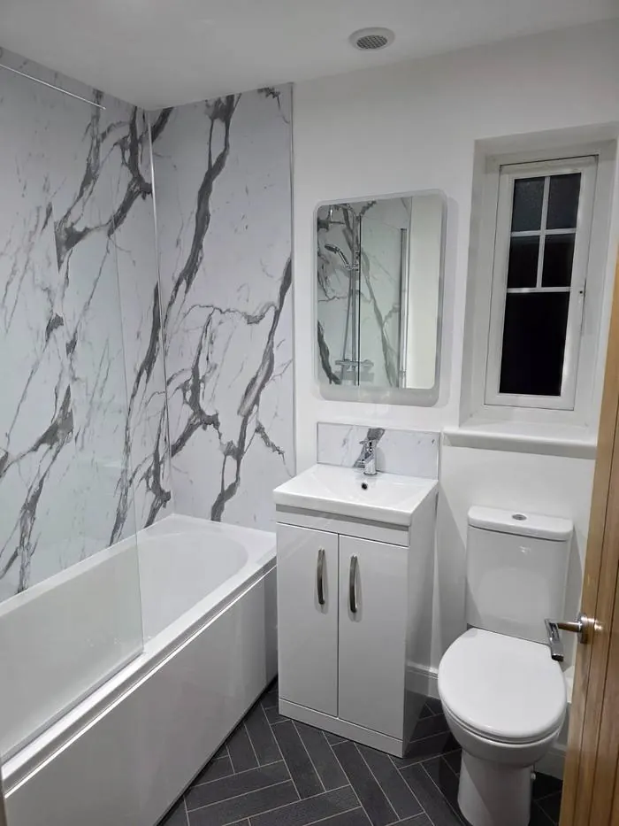 Marble bathroom finished to a spotless standard after a JTTW deep clean