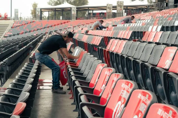 Illustrative photo of venue seating cleaning for events